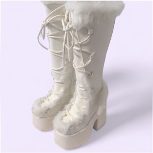 Demonia White faux fur platform boots with lace up detail Camel-311